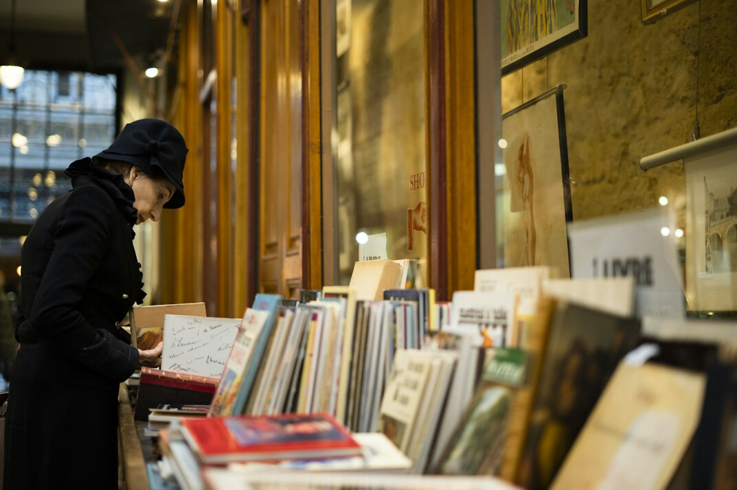 person browsing old books